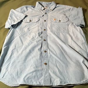 Men’s Carhartt blue, short sleeve, button up shirt.  Pockets on chest.  Size L